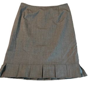 Knee length skirt with pleated hem